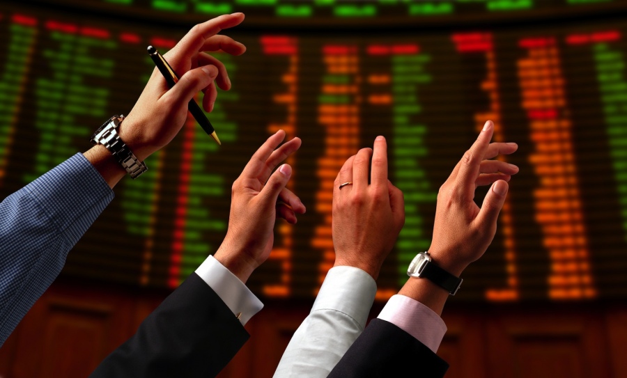 What is a Stock Exchange and what does trading stock mean?